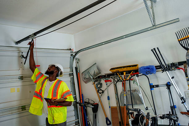 Professional Garage Door Panel Replacement technician working in Clive, IA